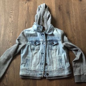 jean jacket with hoodie and gray sleeves